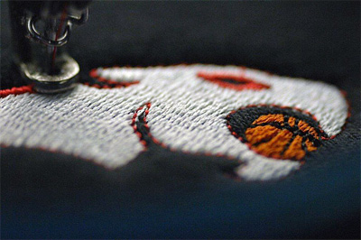 vezenje logoa na radnim odelima